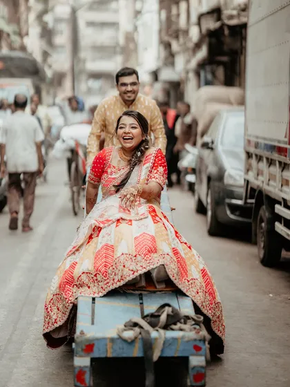 Finding joy in the heart of the city. This candid shot from a pre-wedding session in the bustling streets of Mumbai captures the pure, unscripted laughter that we live for. It’s about celebrating your love in the places that feel like home.