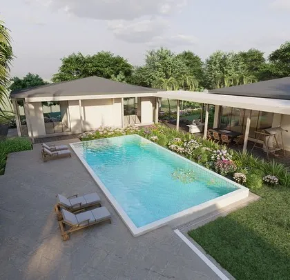 This 3D render visualizes the poolside experience for an Alibag villa project. We designed a resort style landscape with palm trees and flowering shrubs surrounding the pool, creating a perfect setting for relaxation and entertainment.