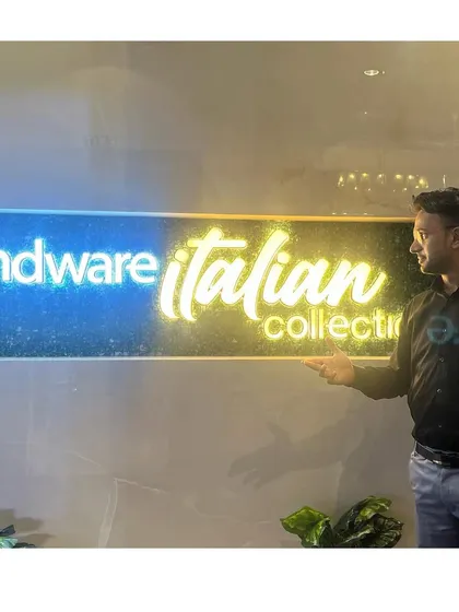 Posing with the glowing Hindware Italian Collection logo. The ambiance of a corporate event is always top-notch.