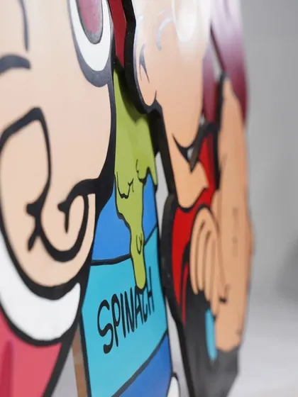 A side view of the Popeye piece, highlighting the thickness of the MDF layers. This is what gives the artwork its unique three-dimensional quality.