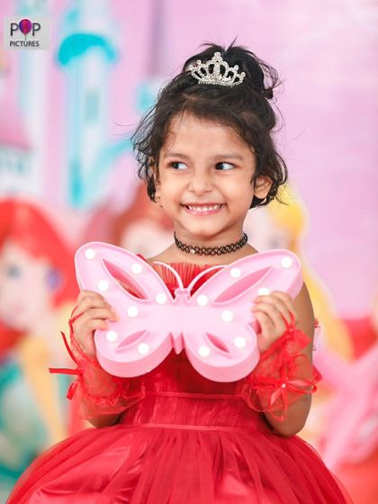 A charming 'Winnie the Pooh' themed birthday party, with rustic decor, character cutouts, and honey pot props, creating a sweet and cozy atmosphere.