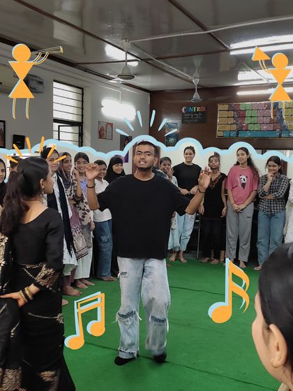 An instructor uses expressive gestures to teach a song, and the students mirror his energy. This dynamic interaction shows how we use more than just words to communicate the joy of music.