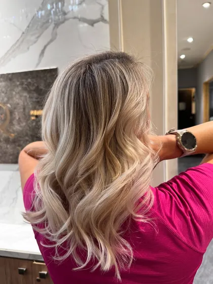 A final look at this stunning pearl blond balayage, a perfect example of a cool-toned blonde.