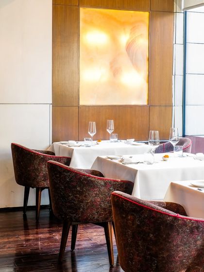 Our spacious main dining room is perfect for leisurely lunches. As light fills the space, every meal feels like a relaxing escape.