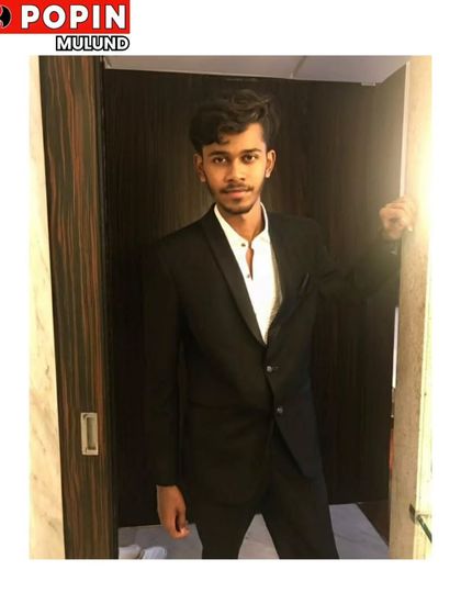 This client chose a simple yet elegant black suit for his event. It's a versatile piece from my collection that can be dressed up or down.