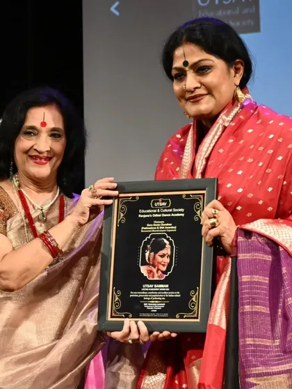 Being presented with the 'UTSAV SAMMAN' award.