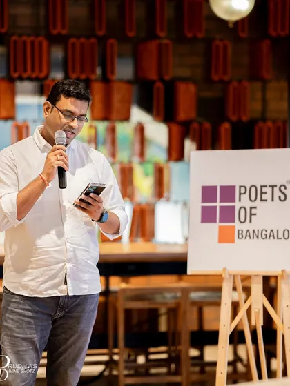 A poet shares his work at the "Wheel of Life" event. The theme resonated deeply with our community of writers.