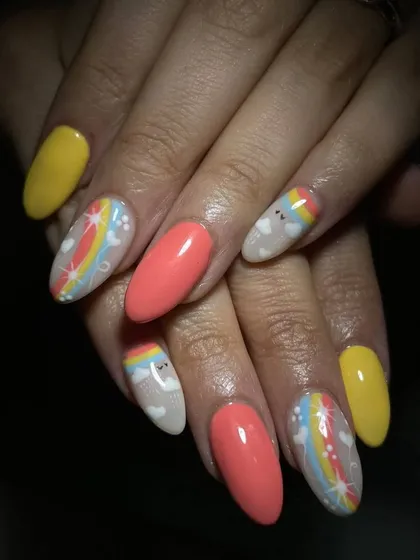 These nails are just too cute. The design includes hand-painted rainbows, clouds, and heart-shaped balloons for a super adorable summer look.
