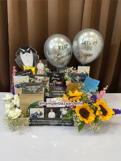 Our fully loaded Groom To Be Hamper! It's packed with his favorite snacks, personalized notes, photos, balloons, and fresh sunflowers to brighten his day.