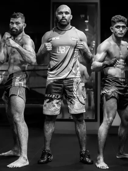 One Team, One Goal. This is my core belief. Here I am with two of my top fighters. We stand together, we fight together.