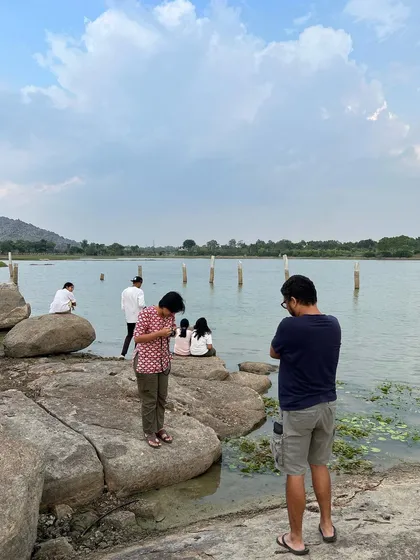 A quiet moment of reflection by the water during our photography program's off-site trip. We believe that new environments and experiences are powerful catalysts for creativity.