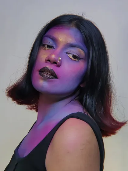A profile view of my galaxy makeup, showing the gold highlighter used to create a "stardust" effect on the high points of the face.