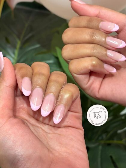 A soft and pretty pastel pink French manicure. This is a subtle and modern update to the classic, perfect for an everyday chic look.