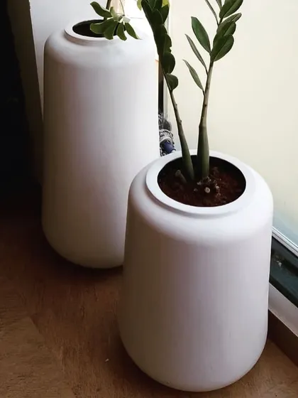 Your entrance sets the first impression for your entire home. For this foyer, I chose these sleek, modern white planters to create a clean and welcoming vibe. Paired with hardy, easy to care for plants, they make the space feel fresh and bright the moment you walk in.