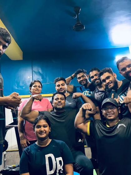 A candid moment with the team. We are a diverse group united by a single passion: powerlifting.