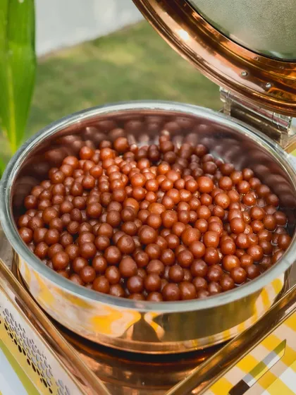 These bite sized Angoori Gulab Jamuns are soaked in a fragrant sugar syrup. They are incredibly soft and melt in your mouth, offering a small but powerful burst of sweetness.