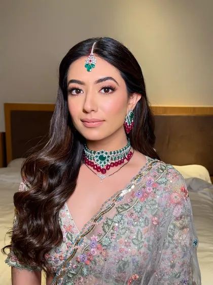 This portrait showcases the natural-looking finish of a soft glam look. You'll learn to choose the right products and techniques for a dewy, non-cakey base.