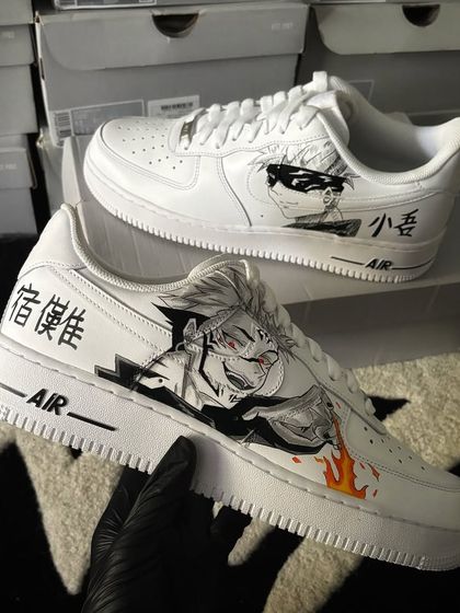 A custom Nike Air Force 1 with a black and white manga-style design of Sukuna and Gojo from Jujutsu Kaisen.
