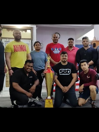 The Powerlifting Studio team being honored at a major competition. Our gym produces champions.