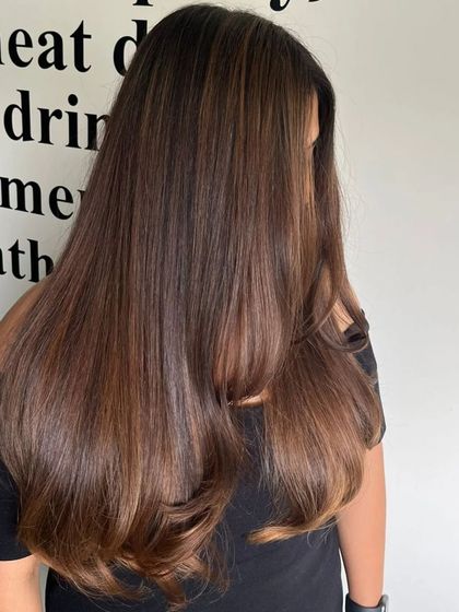 A different angle of the straight balayage, highlighting the sleek finish.