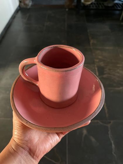 A perfectly pink, hand-built cup and saucer set. The rustic edge of the clay gives it so much character.