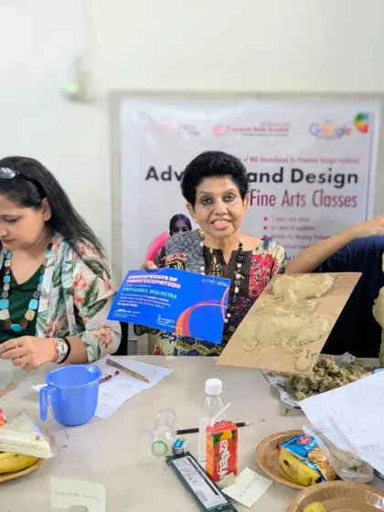 My workshops are a space for adults to unwind and create too. Here, participants in a masterclass are busy sculpting, with one proudly holding her Certificate of Participation.