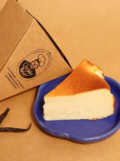 Behold, the Basque Burnt Cheesecake in its purest form. Notice the beautifully caramelized top and the dense, creamy center. I use real vanilla beans to give it a luxurious flavor that makes it the god of all cheesecakes.
