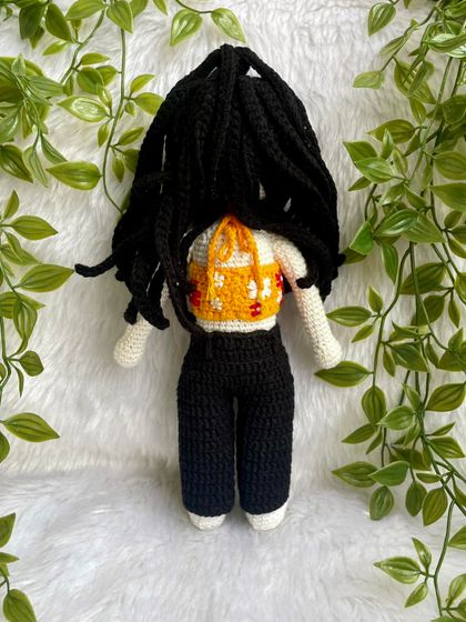 This replica doll features beautiful braided hair and a floral halter top. The customer requested no mouth for a unique, stylized look, which I think turned out so sweet and artistic.