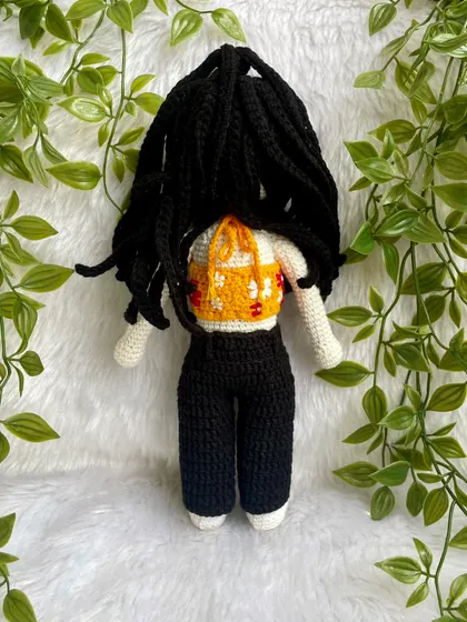 This replica doll features beautiful braided hair and a floral halter top. The customer requested no mouth for a unique, stylized look, which I think turned out so sweet and artistic.