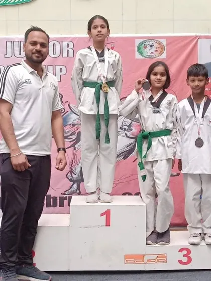 Our champions on the podium at the Delhi State Sub-Junior Championship. We guide students to excel in their specific weight categories.