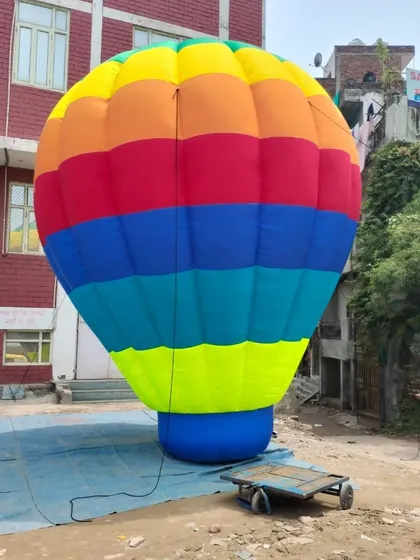 This huge, rainbow-colored hot air balloon inflatable is a classic choice for grabbing attention from a distance. It's perfect for large grounds, fairs, and outdoor events.