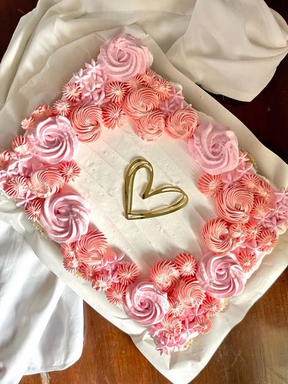 A beautiful shot of the pull-apart cupcake cake, made with 20 cupcakes arranged in a square and decorated with pink ombre frosting.