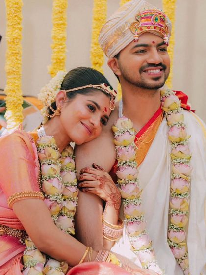 A duplicate of the sweet and intimate portrait of the bride resting on the groom's shoulder.