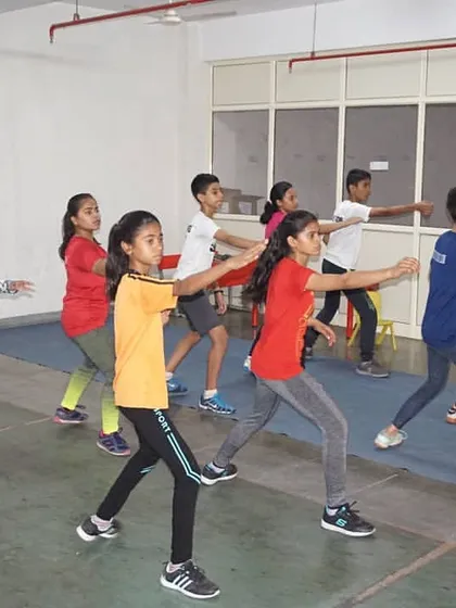 A group of our youngest fencers learning the basic stances and movements. We make training engaging and focused, even for our beginner athletes.