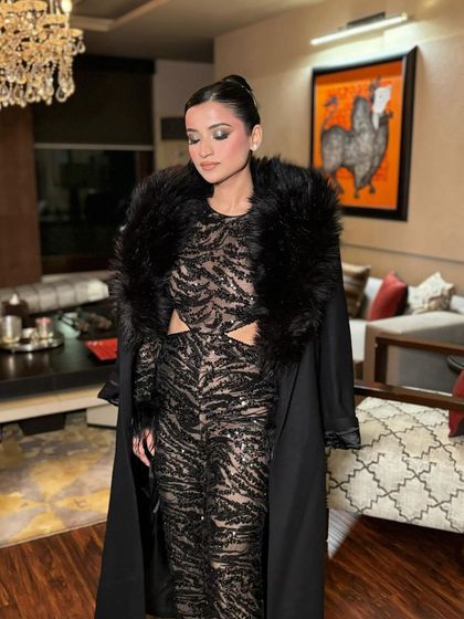 A candid moment showing off the beautiful silver and black smokey eye. It's blended to perfection for a seamless, dramatic effect.