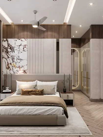 For this parent's room in Gurugram, we used a minimalistic classic theme with a neutral color palette. The bed wall combines marble and leather fabric, adding texture and refinement to the space.