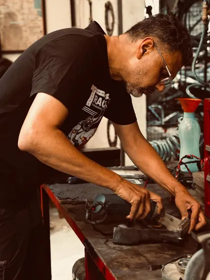 Me, Anand, getting my hands dirty on the workbench. This is what it's all about.