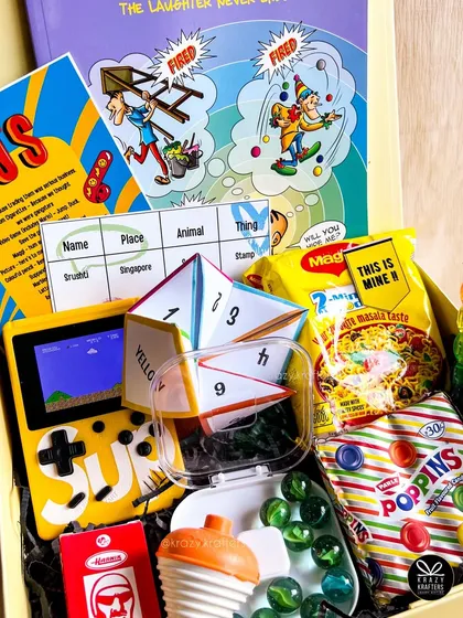 Take a trip down memory lane with our 90s nostalgia box. We've packed it with bachpan ki yaadein, from a classic video game and Poppins to a Suppandi comic and the 'name, place, animal, thing' game.