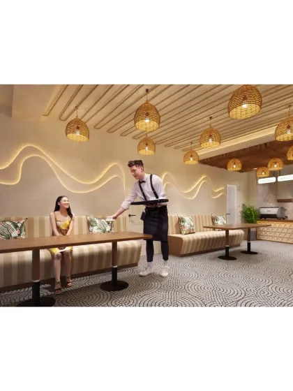 This image captures the cafe's service in action, showing how the design creates a pleasant environment for both customers and staff.