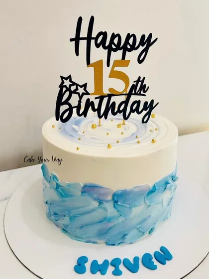 This cake is smoother than a teenager explaining their screen time. A cool blue textured cake for a 15th birthday.