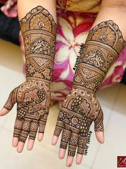 An elegant and traditional design perfect for an engagement or for a bridesmaid, featuring intricate floral and peacock patterns.