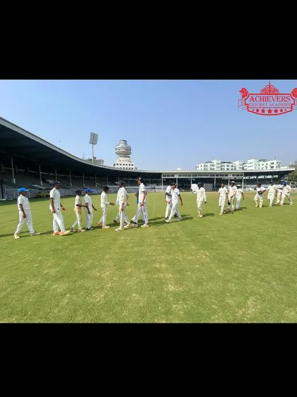 Our players walking onto the field at Brabourne. The experience of playing in a professional stadium environment builds confidence and mental toughness.