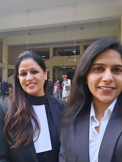 Another picture with a colleague, reflecting our collaborative spirit. We believe two minds are often better than one when strategizing for a case.