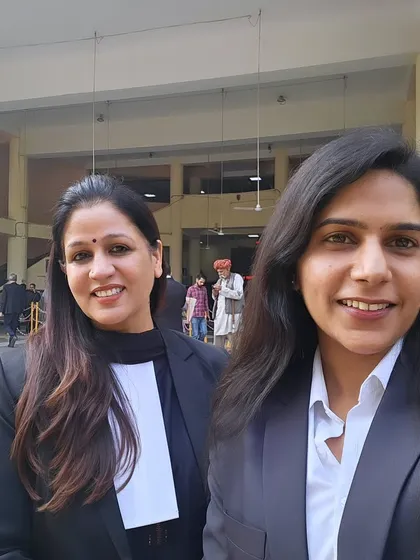 Another picture with a colleague, reflecting our collaborative spirit. We believe two minds are often better than one when strategizing for a case.
