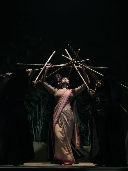 A powerful scene from 'Sitayana' using props like bamboo sticks to create a visually compelling stage picture. My work often incorporates props to enhance the storytelling.