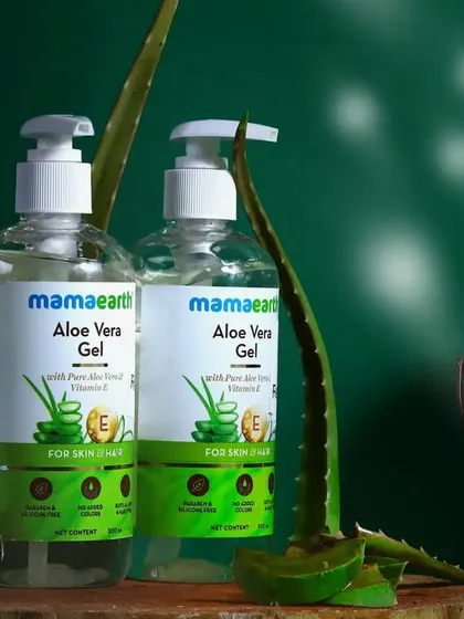 Another angle of the Mamaearth Aloe Vera Gel setup, this time with softer lighting to create a gentle, caring mood for the skincare product.
