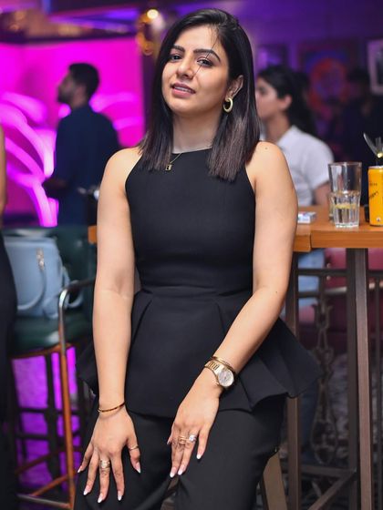 A guest enjoying a drink at the bar. The venues I play at offer excellent food and beverage options to complement the music.