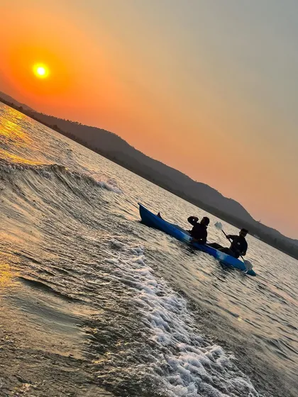 Paddling together as a team while enjoying the golden hour on the lake. Our double kayaks are great for pairs.