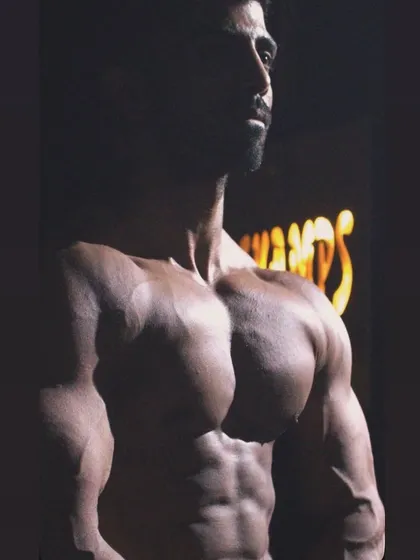 I call myself the Promaker, and this is the physique that backs it up. This dramatic shot captures the conditioning and muscle definition that I not only teach but also live by every single day.