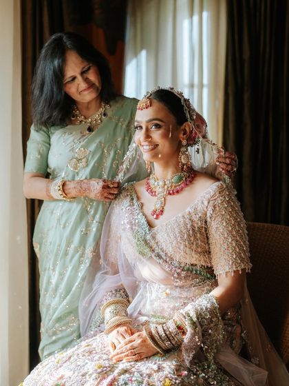 A precious moment with her mother. The love and happiness in this photo are what weddings are all about.